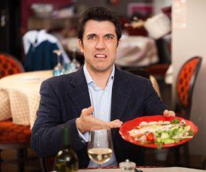 Man-Holding-Plate-of-Food